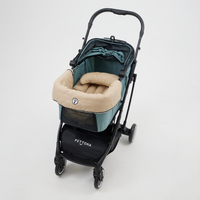  PETTENA Knight ペットカート ミントブルー × ベージュのダイヤ柄キルティングクッションセット。爽やかなブルーの車体に、ふっくらとした厚手のあごのせマットを組み合わせ、愛犬の快適な移動と振動吸収を実現。